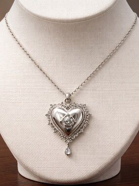 Kendra Scott Silver Heart Locket Necklace with Floral Accent